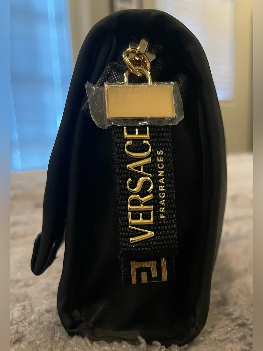 Versace Fragances Black and Gold Logo Strap Pouch